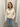 Polo-Strickpullover mit Blumenkragen und gestickten Herzen